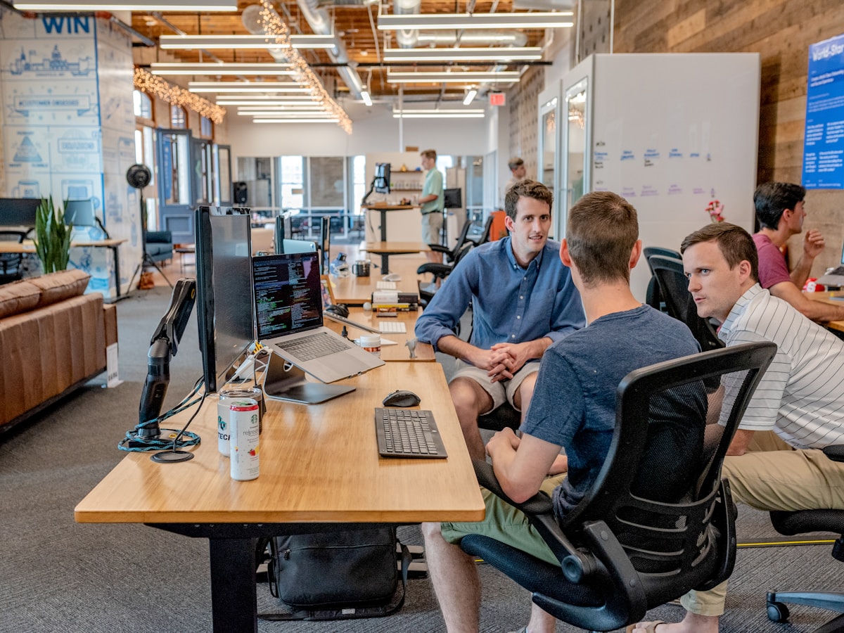 Global team collaborating around a meeting table